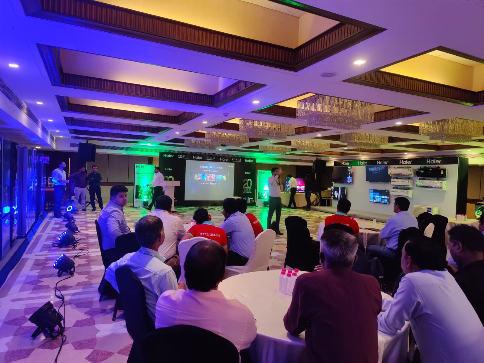 Corporate dealer meeting with presenter on stage