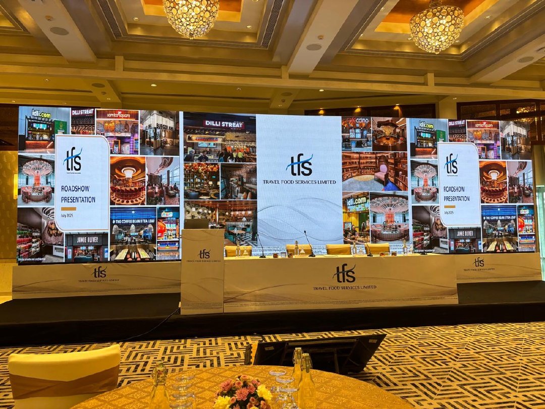 IPO listing ceremony stage set inside a luxury hotel ballroom